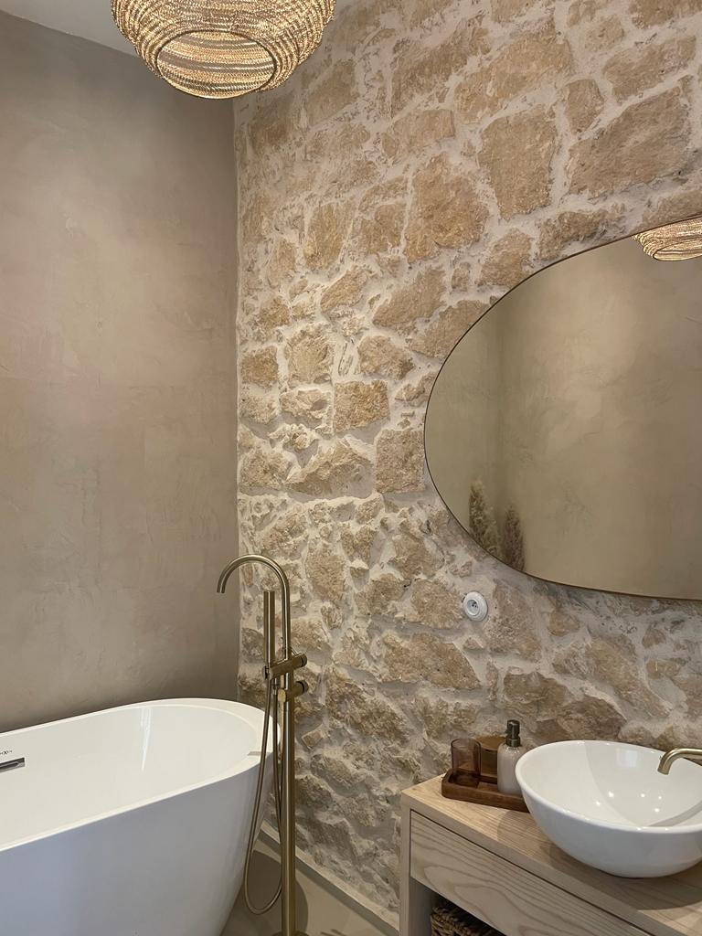 microcement and stone in bathroom