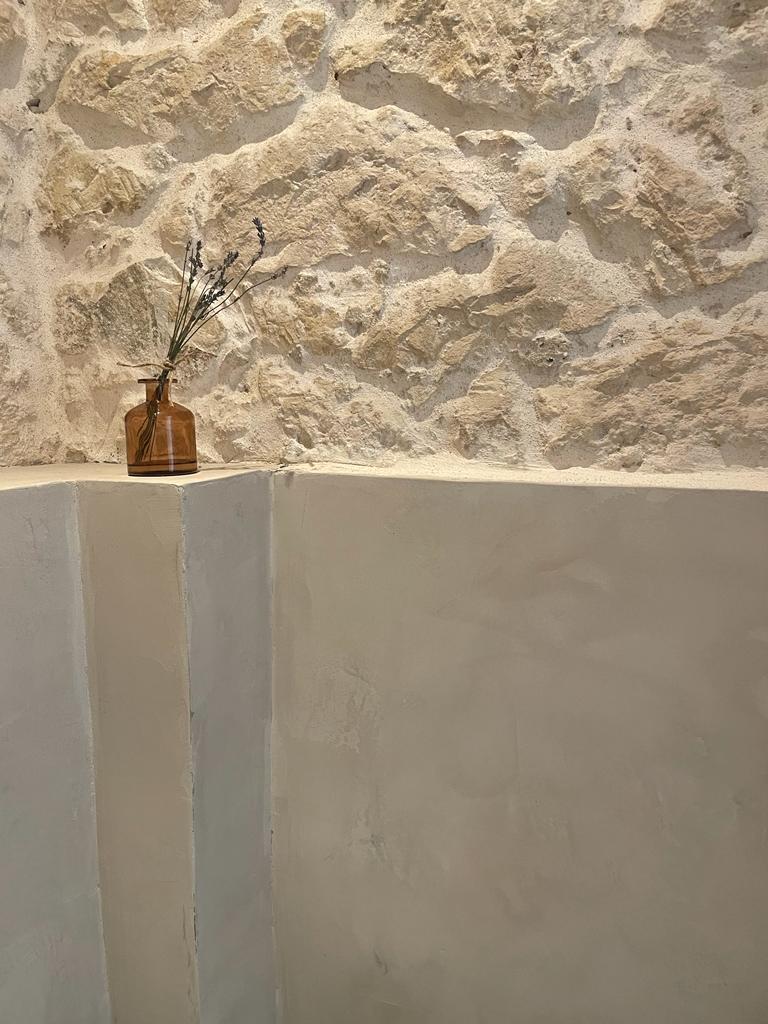 microcement and stone in bathroom